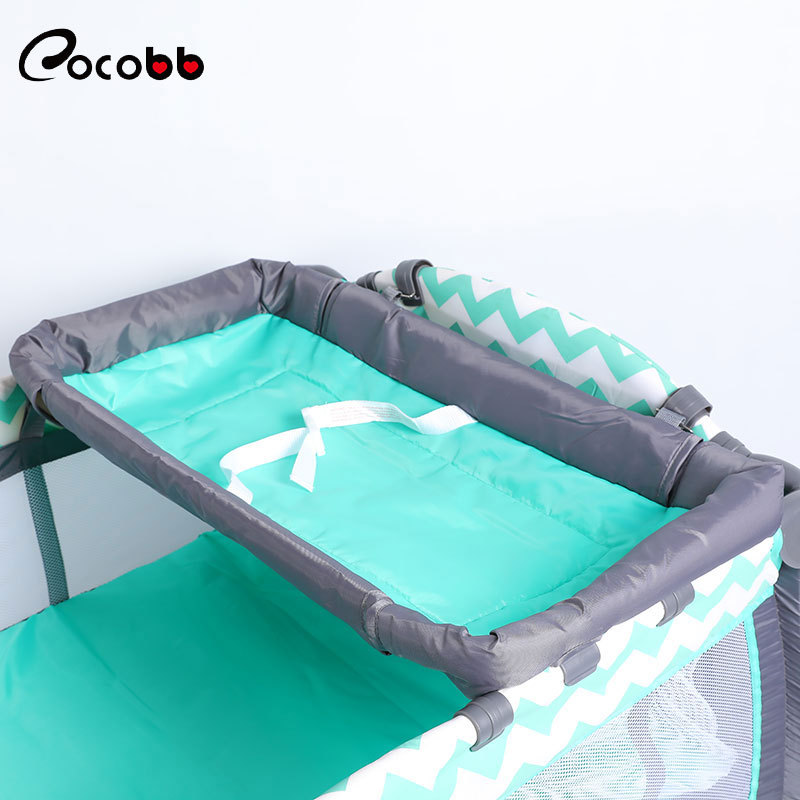 Concha de cacao cuna portátil multifuncional pañal Mesa niños plegable cama de juego móvil cama de bebé al por mayor image 4