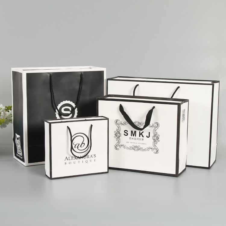 手提黑边白卡纸袋定做环保彩印服装购物袋定制创意广告礼品袋logo