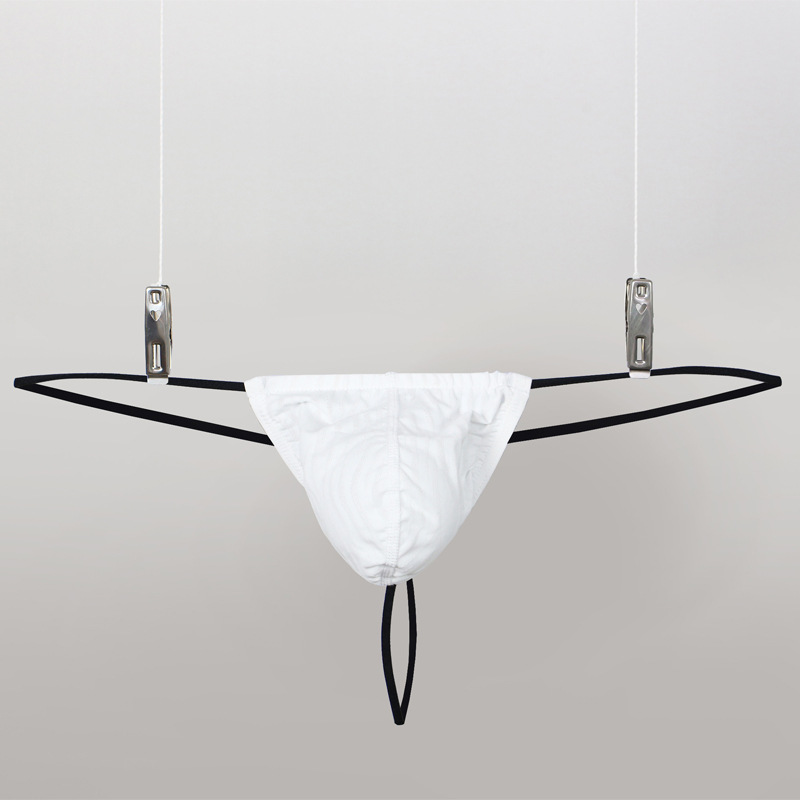 Factory wholesale sexy men's underwear corrugated personality low waist leakage hip belt pants comfortable breathable thong generation hair