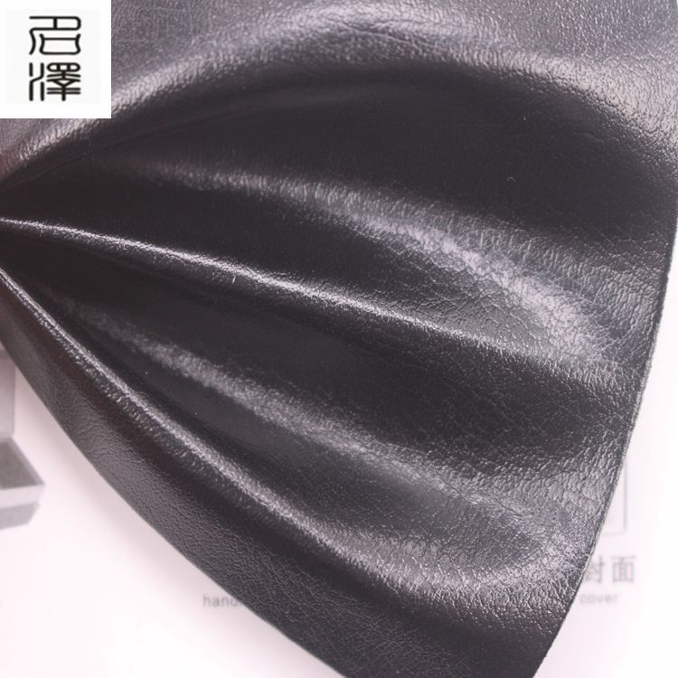 厂家现货直销0.55mm水刺底仿压变64纹PU革装饰革手机套革包装盒