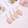 Organic sophisticated earrings, simple and elegant design, wholesale