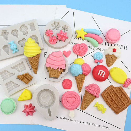 Various ice cream fondant silicone molds, macaron cones, meringue chocolate molds, cake decorations