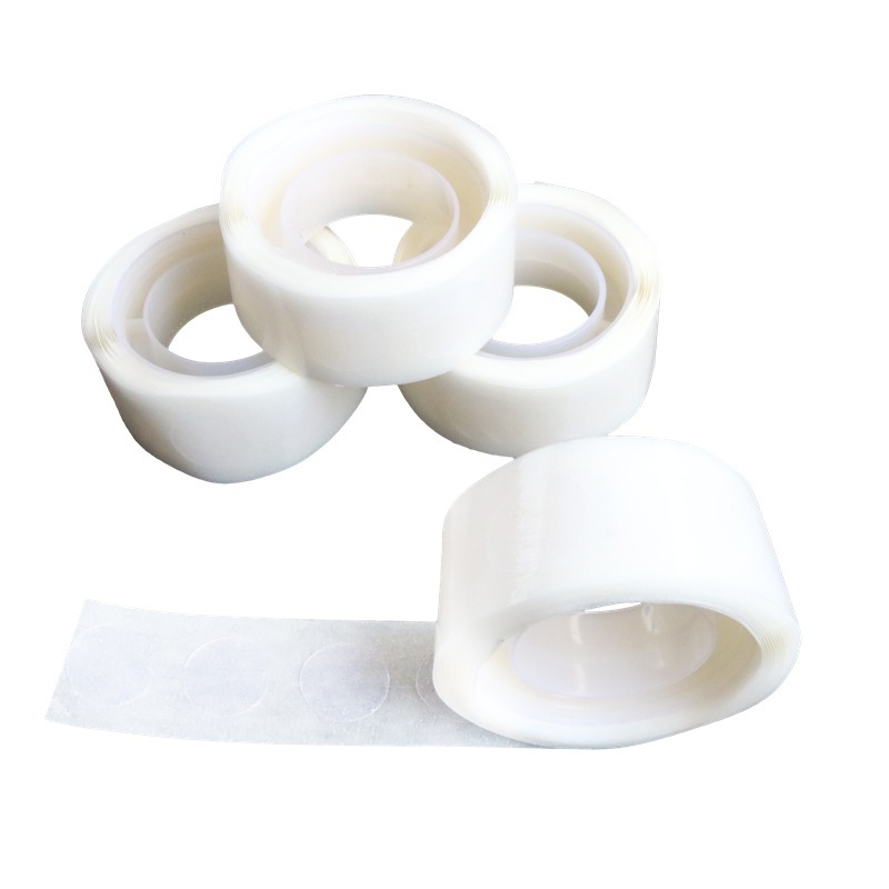 Venta al por mayor de fábrica de dispensación de globo transparente que no marca Punto de pegamento arreglo festivo adhesivo de doble cara adhesivo en forma de rollo 100 tabletas