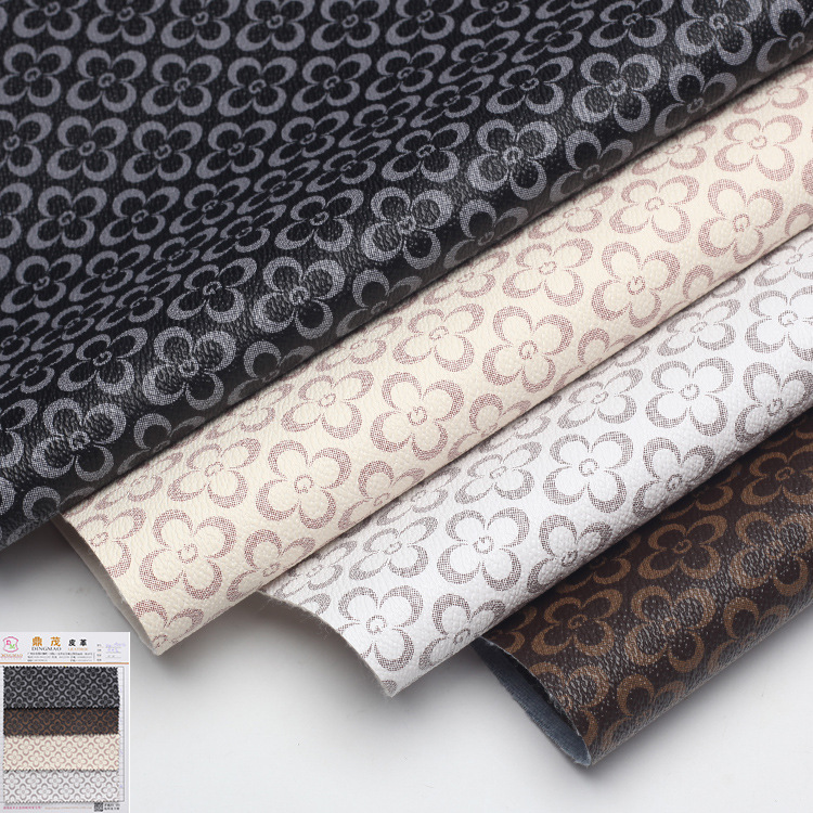 热销四叶花皮革PVC面料DM1903176箱包鞋材服饰汽车革厂家现货供应