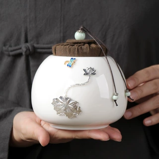德化白瓷镶鎏银饰茶叶罐陶瓷中式密封存储罐绿茶普洱茶叶礼盒包装