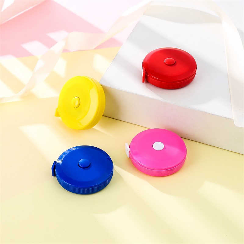 可印logo小巧圆形塑料小卷尺 1.5米伸缩型家用量衣尺软尺圆形皮尺