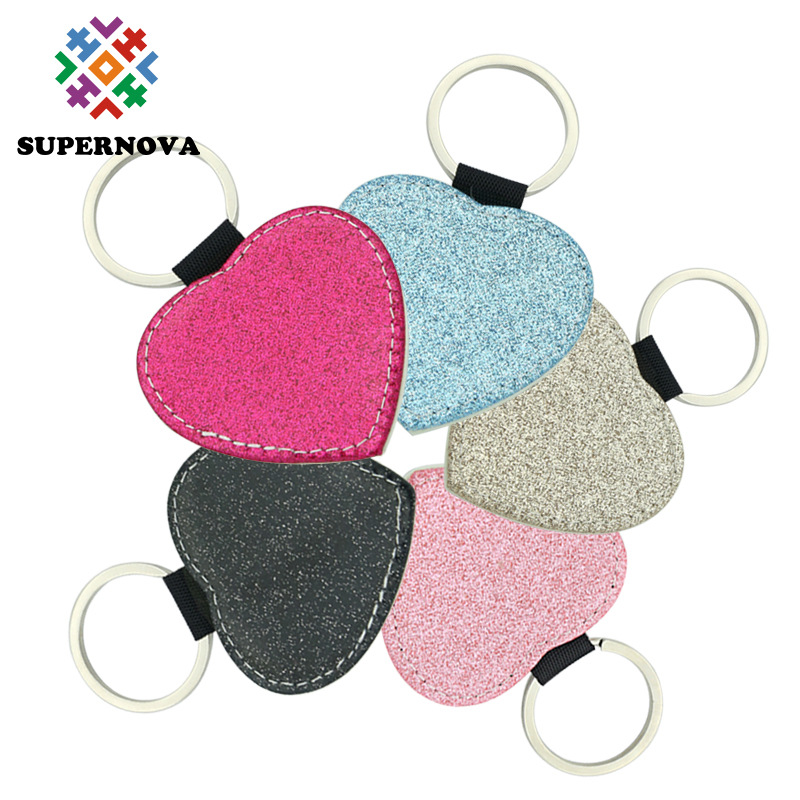 Transferencia térmica en blanco brillante llavero sublimación de un solo lado PU ornamento de cuero colgante llavero material