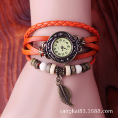 Alibaba.com Hot Selling Vintage Leaf Watch Handmade Woven Vintage Genuine Leather Women's Bracelet Watch Wholesale