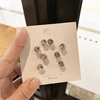 Eight colorful rhinestones