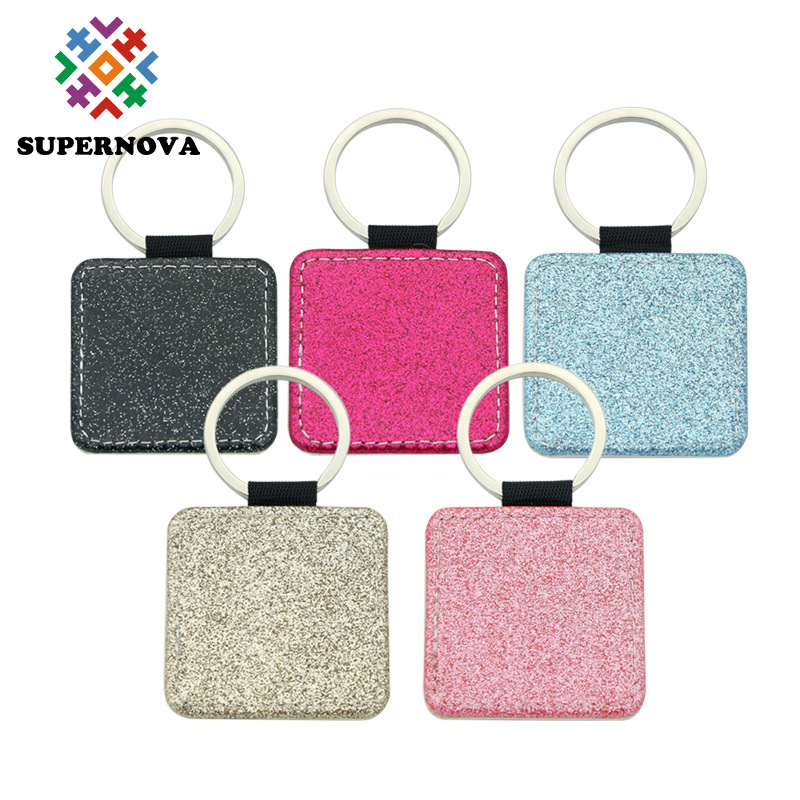 Transferencia térmica en blanco brillante llavero sublimación de un solo lado PU ornamento de cuero colgante llavero material