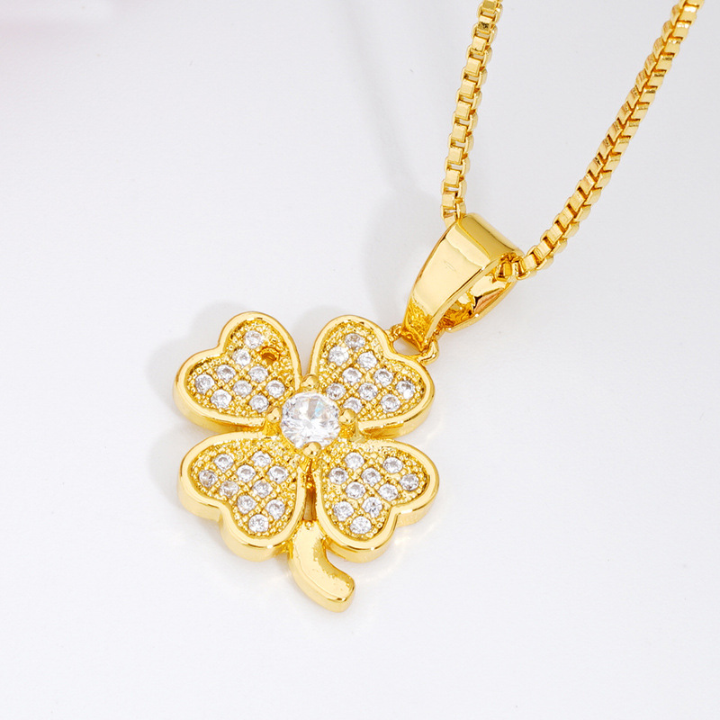 Vietnam Oro de las mujeres de estilo europeo de diamantes incrustados trébol colgante de oro de imitación de las mujeres de estilo coreano simple micro-incrustado ZIRCON colgante
