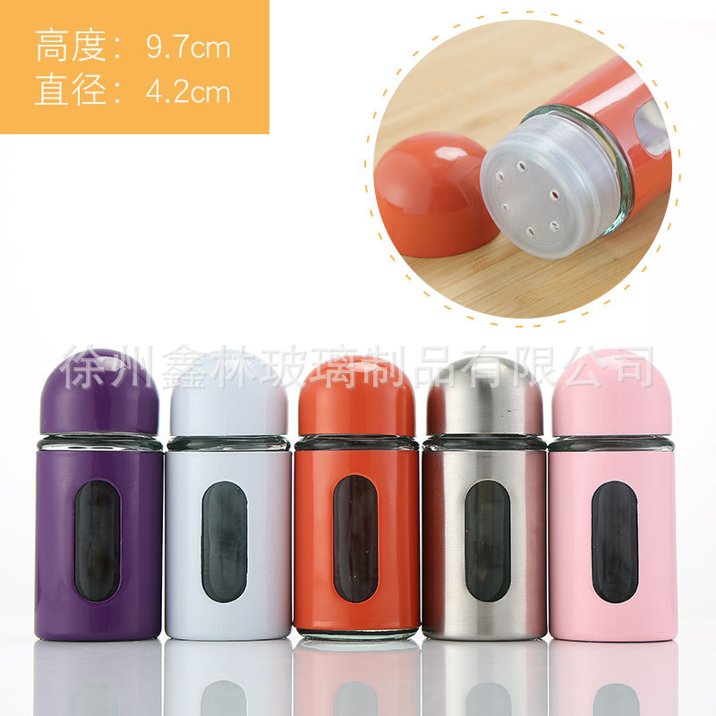 Venta al por mayor creativa nueva cocina suministros vidrio condimento botella de acero inoxidable giratoria condimento botella frasco botella de pimienta