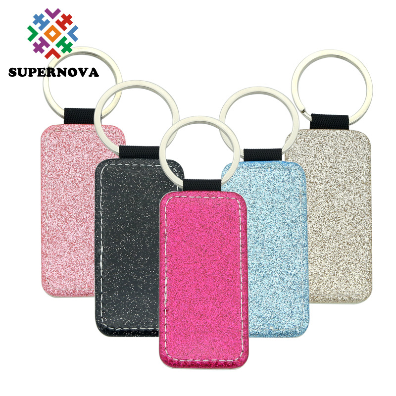 Transferencia térmica en blanco brillante llavero sublimación de un solo lado PU ornamento de cuero colgante llavero material