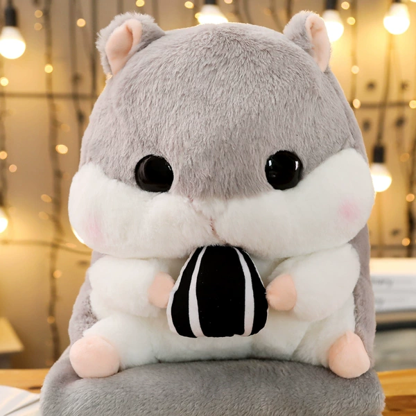 Gray hamster hug melon seeds