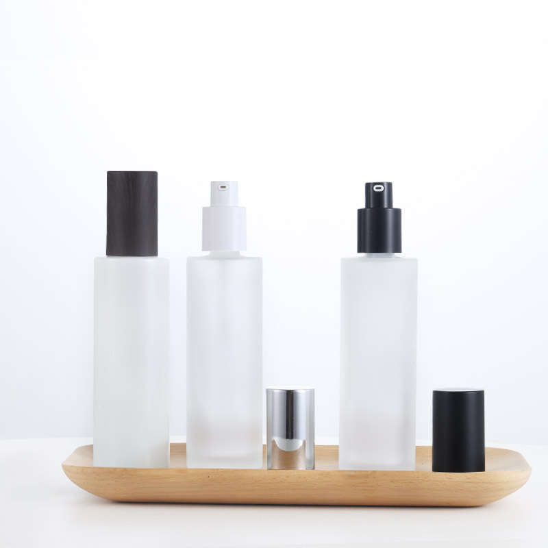 Conjunto de vidrio cosmético botella nacarado blanco botella de loción recta en stock botella de prensa de loción crema sub-botella