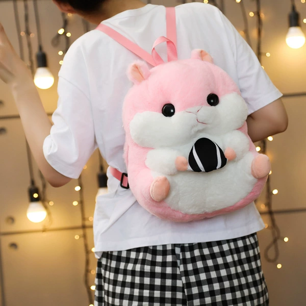 Pink hamster holding melon seeds (backpack)