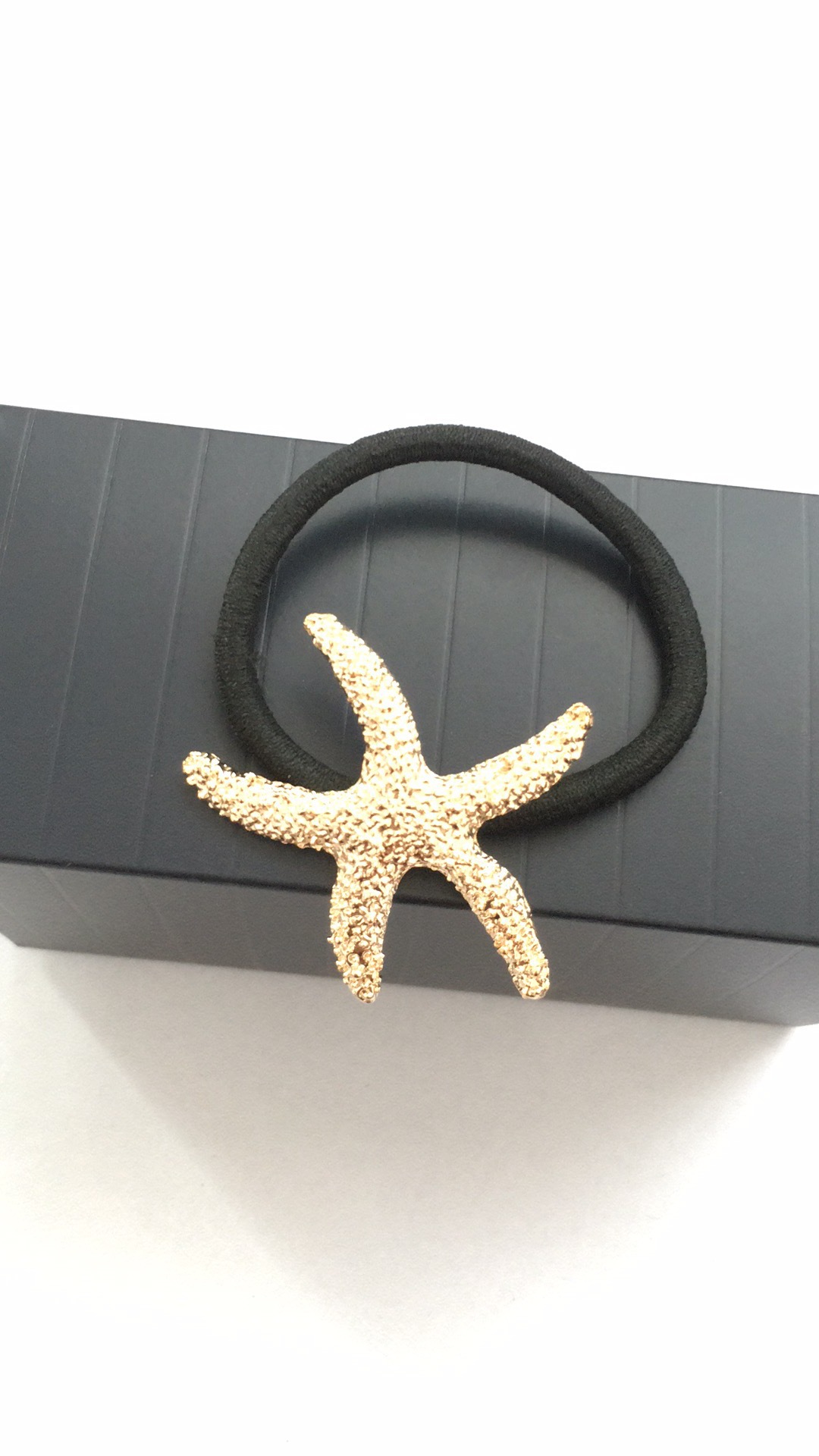 Fuente de la joyería de estilo coreano anillo de pelo de estrella de mar de oro textura de metal cuerda de pelo accesorios para el cabello estilo del océano precio de fábrica