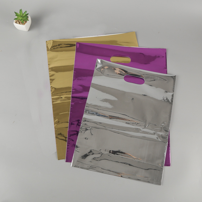 现货批发塑料袋/服装手提袋/礼品袋/购物袋/复合银塑料袋加印logo