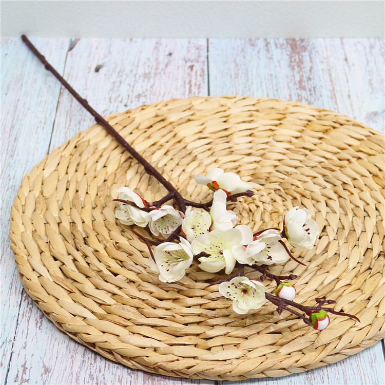 Venta al por mayor chino pastoral flor artificial del ciruelo al por mayor flor falsa pequeña flor del ciruelo rama salón flor decorativa