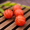 Organic red carved set from Yunnan province, bracelet, accessory, rosary with round beads