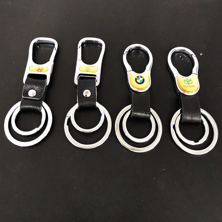 I1 823 903-4 llavero de cuero llavero accesorios de coche 2 yuanes tienda de suministro de joyas al por mayor