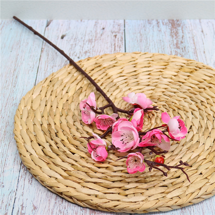 Venta al por mayor chino pastoral flor artificial del ciruelo al por mayor flor falsa pequeña flor del ciruelo rama salón flor decorativa