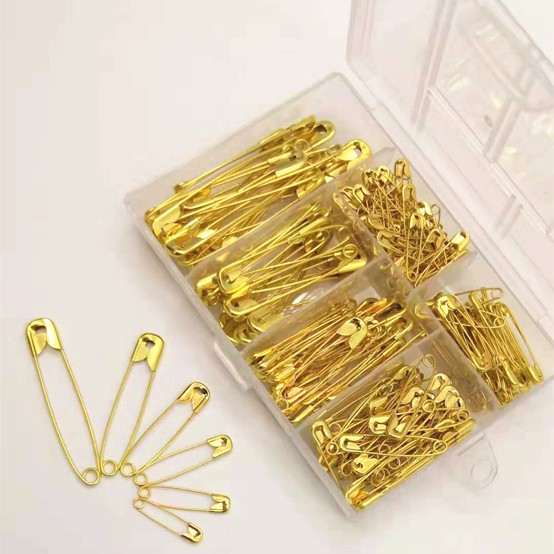 thumbnail image 1 of Combinación de imperdible de ropa con imperdible de oro y plata con alambre de acero de alta resistencia, 1 of 6