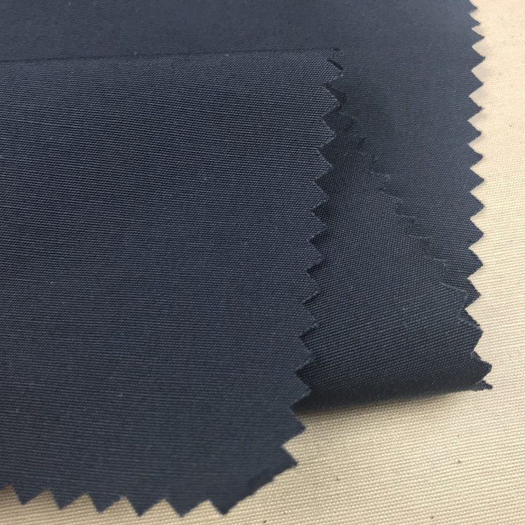 150D*21S涤棉交织面料平纹涤棉布风衣夹克秋冬批发扎染秋冬面料