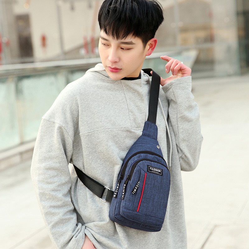 Venta al por mayor bolsa de pecho para hombres 2021 primavera nuevo estilo coreano casual impermeable de moda deportiva bolsa pequeña bolsa de mensajero del hombro bolsa de lona
