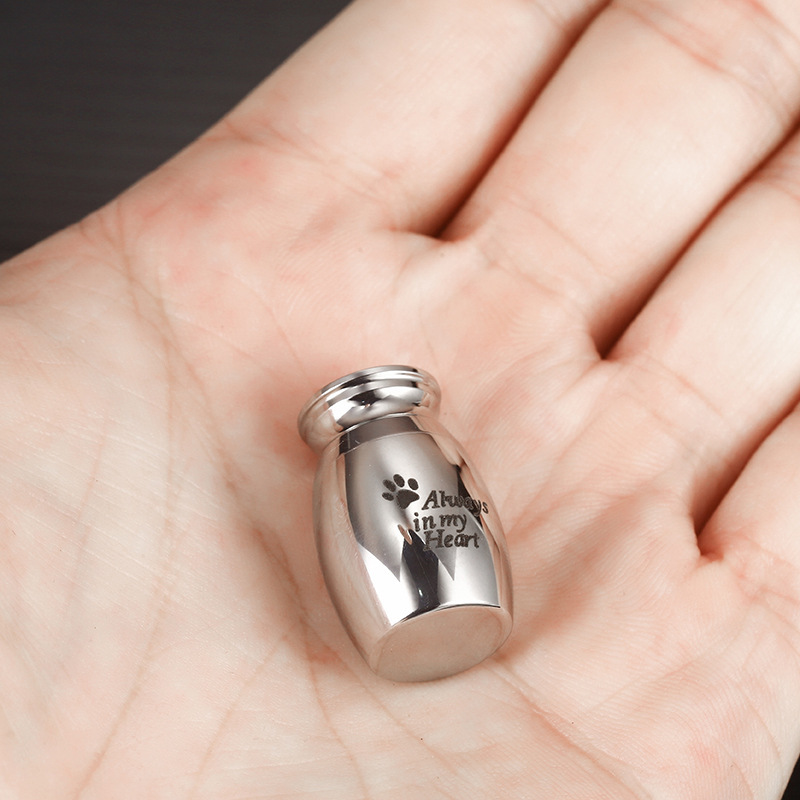 Spot wholesale perfume bottle small ornaments silver metal dog paw print urn jar Memorial pet funeral urn