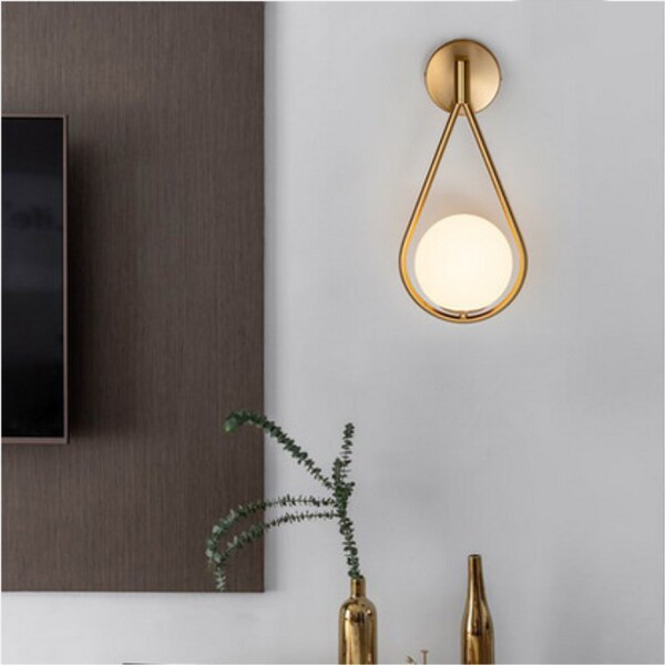 brass modern and minimalistic glass sconce for living room for…
