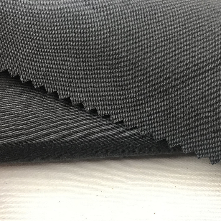 32S*100D磨毛棉锦交织面料棉锦府绸面料平纹棉锦风衣夹克批发秋冬