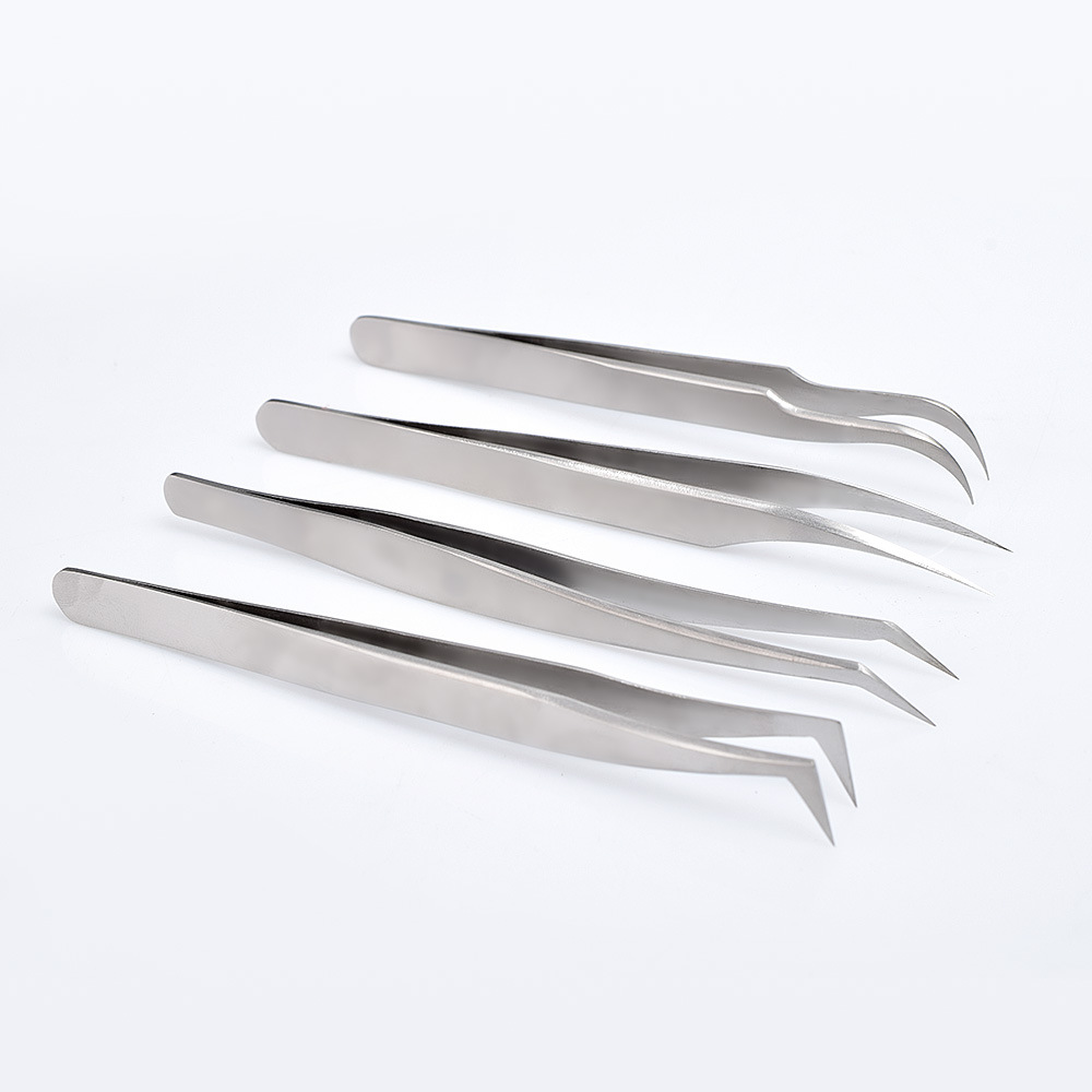 Factory direct sales of eyelash extension tweezers, including gold feather tweezers, dolphin tweezers, and eagle beak tweezers. Eyelash extension tools.