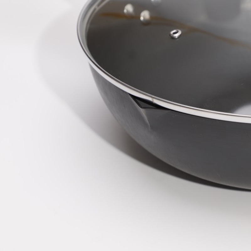 Fabricantes nuevo antiadherente WOK de hierro Cocina de Inducción de gas disponible cocina de interior olla al por mayor