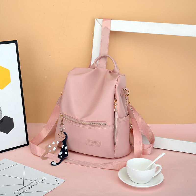 Mochila de bolsa transfronteriza para mujer 2024 nueva mochila de mujer de moda de viaje antirrobo tela Oxford de moda ligera a juego