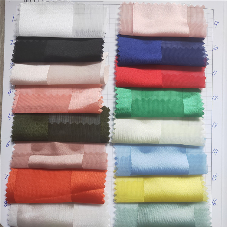 现货供应 宽条欧根纱提花面料 条纹提花面料 半身裙服装面料