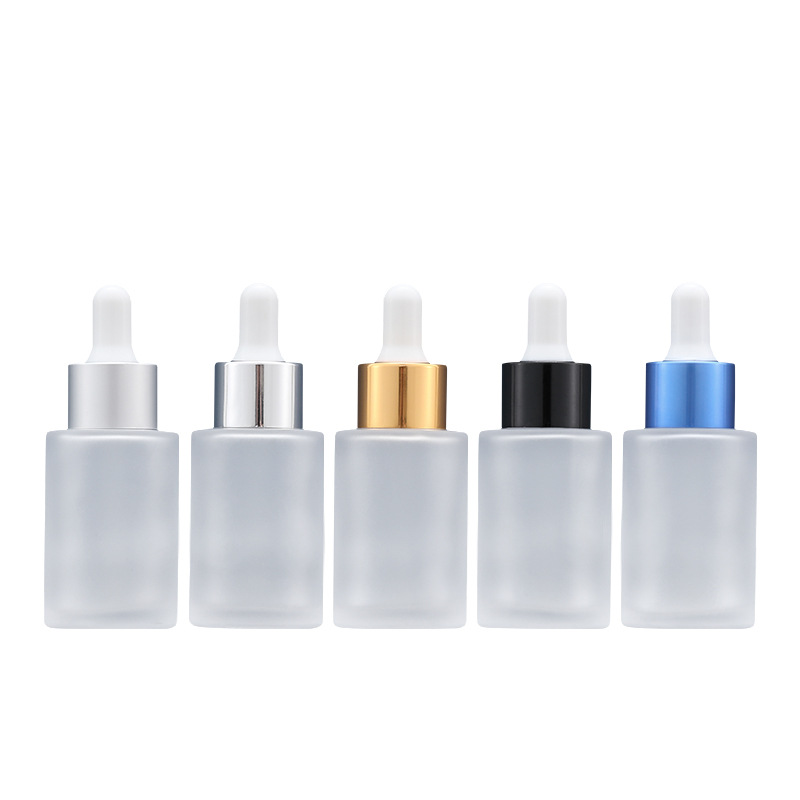 Xumin en stock envases cosméticos botella de líquido de vidrio botella de esencia esmerilada 30ML muestra botella cuentagotas sub-embalaje