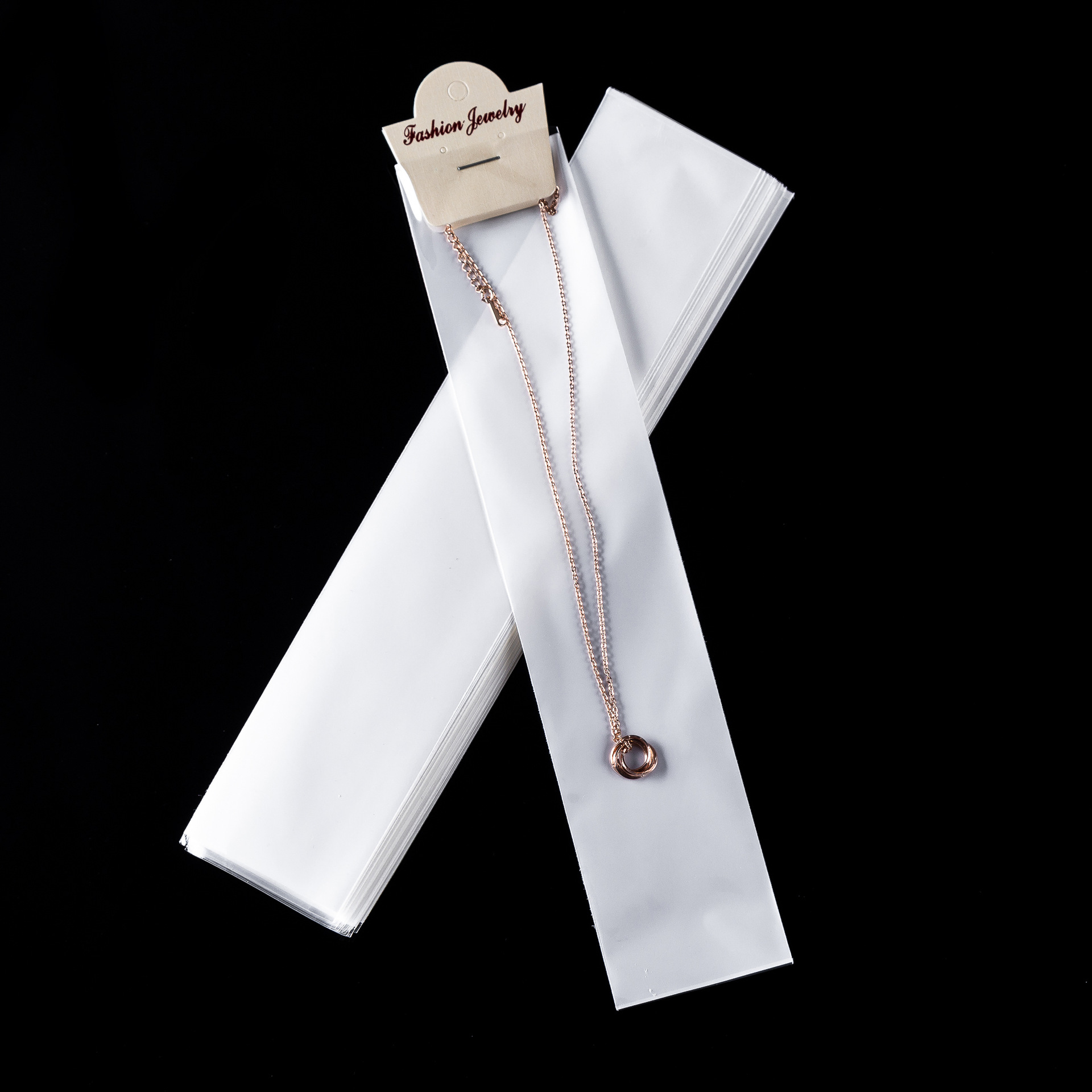 En stock BOLSA DE OPP transparente engrosada OPP película de perlas de tres capas blanco bolsillo plano collar de acero de titanio pulsera bolsa de joyería