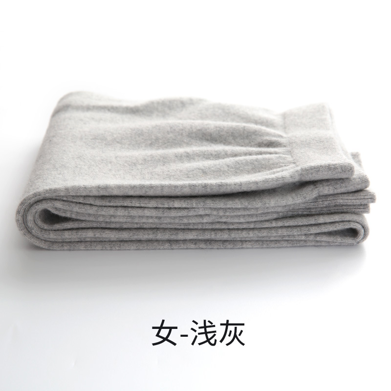 秋冬の新型男性のカシミヤのズボンの薄いタイプのシームレスな女性の弾力性の修身のヤギのズボンのメリヤスの底のズボン