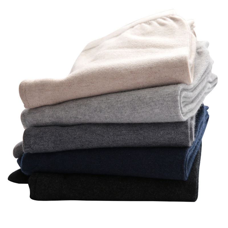 秋冬の新型男性のカシミヤのズボンの薄いタイプのシームレスな女性の弾力性の修身のヤギのズボンのメリヤスの底のズボン