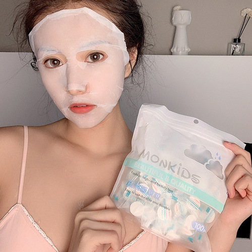 Factory direct sales compressed facial mask 30/50/100 bags of DIY candy mask paper non-woven absorbent mask grains