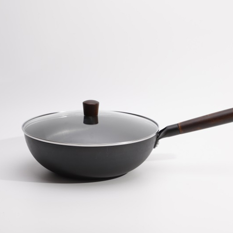 Fabricantes nuevo antiadherente WOK de hierro Cocina de Inducción de gas disponible cocina de interior olla al por mayor