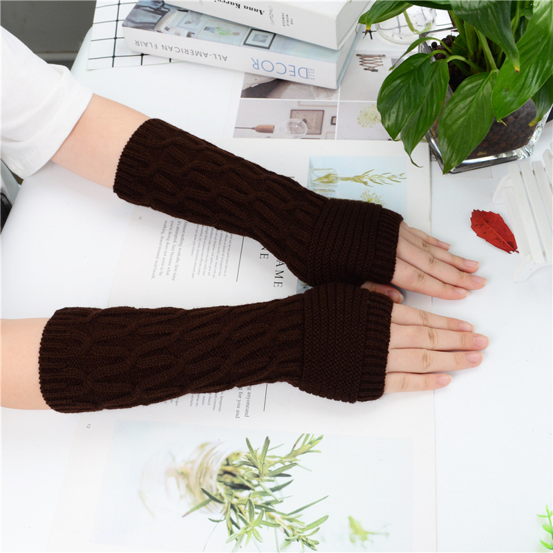 Yifan otoño e invierno al aire libre Oficina cálida mecanografía estilo coreano color sólido japonés X patrón manga media manga de punto manga del brazo