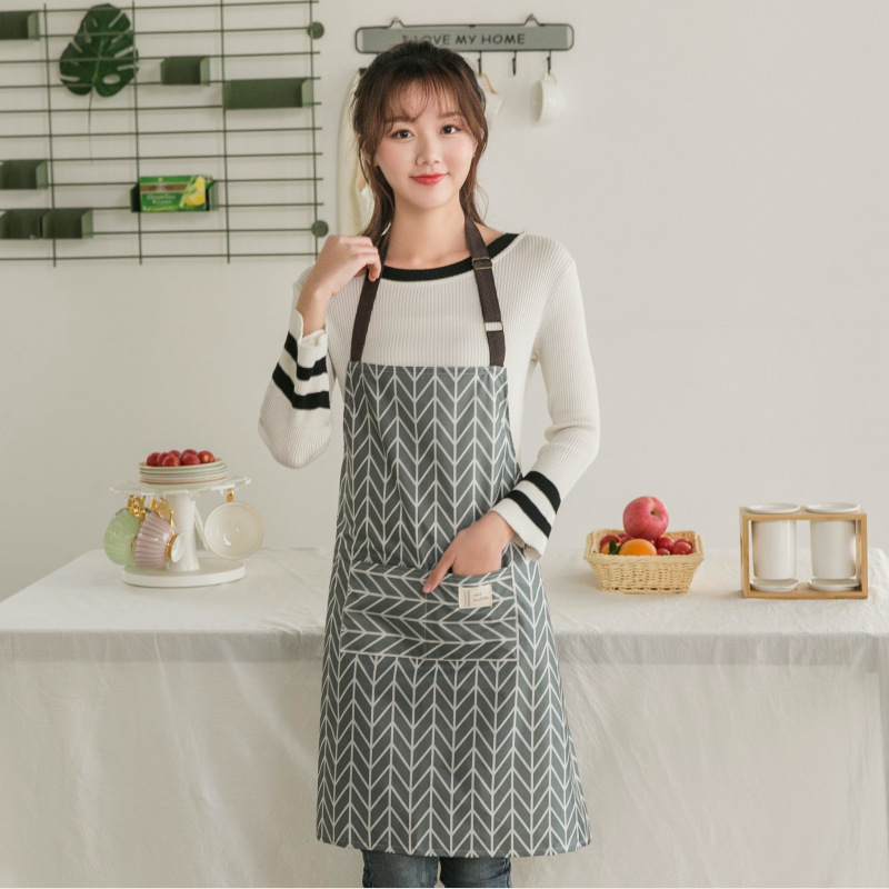 Fabricante delantal ventilador shengpai engrosada doble capa impermeable Comercio exterior coreano princesa delantal regalo personalizado publicidad delantal bolsillo de la cocina