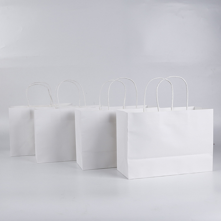 厂家直供手提袋定 制 纸袋定 做 服装包装袋制作印刷logo