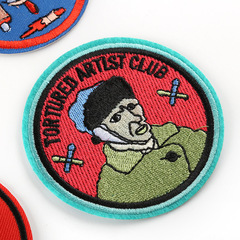 Strawberry-shaped embroidered badge with character head patch, clothing accessories, backpack accessories, cloth label, floral embroidery patch