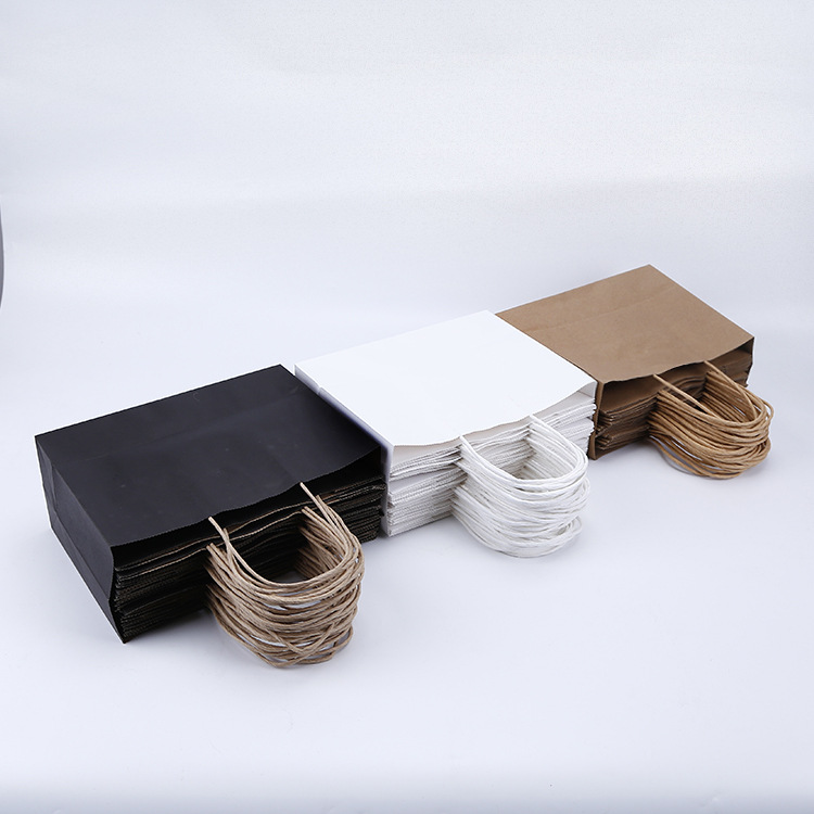 厂家直供广告购物包装手提袋 定 制 服装个性礼品牛皮纸袋定 做