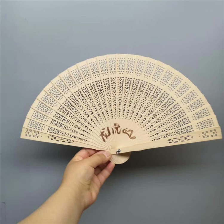 Ventilador de sándalo ventilador de madera transfronterizo soporte de la boda lote mezclado borde hueso talla