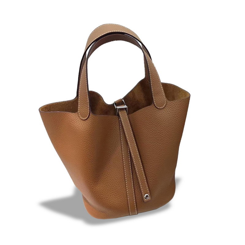 El nuevo bolso de cesta de verduras de marea de cuero togo de piel de vaca de capa superior 2025, bolso de cubo con cerradura de mano, bolso de cuero para mujer