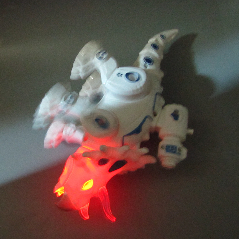 Nueva eléctrica de combate mecánico triceratops luz de música automática para caminar puesto de luz venta caliente al por mayor juguetes de los niños